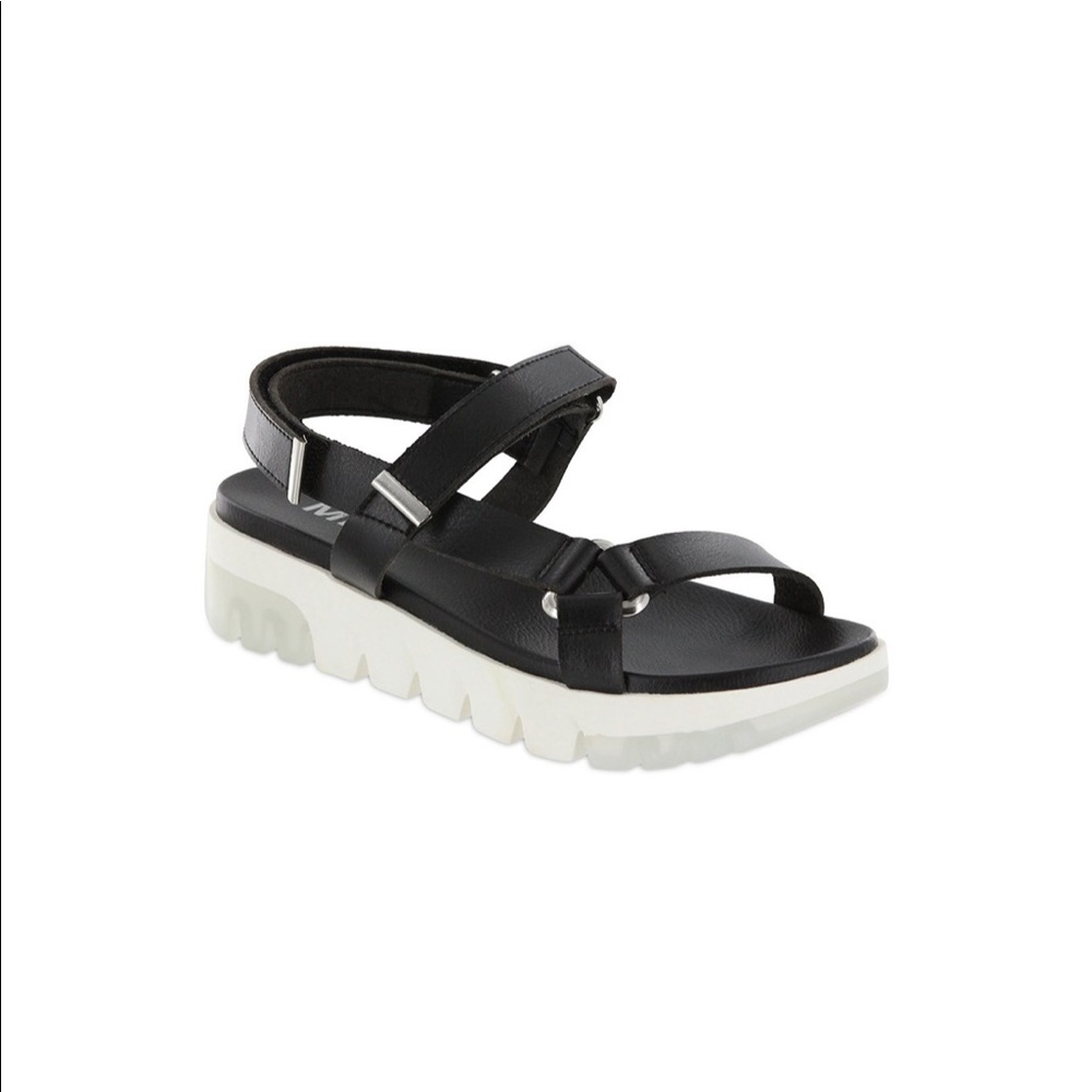 🆕 Trendy sandals with white soles and Velcro-lined ankle closure.